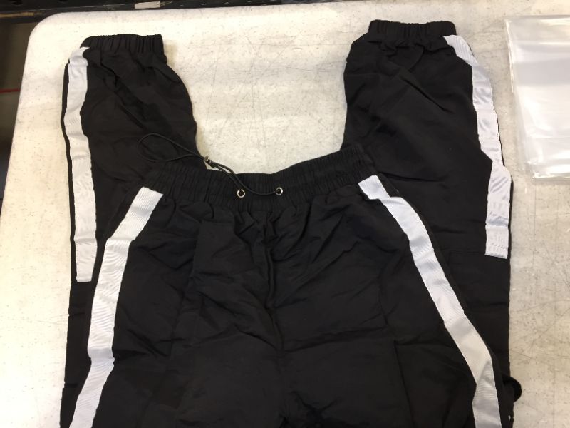Photo 2 of womens small size jogging pants color black and white 