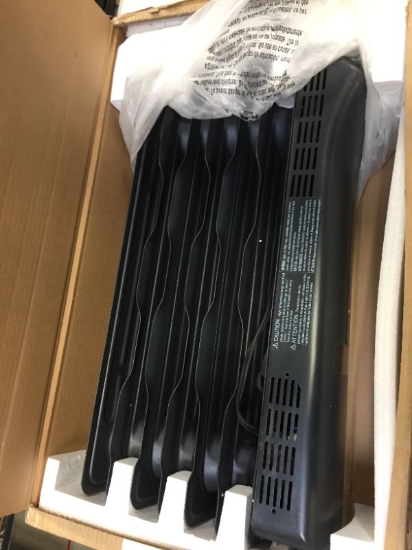 Photo 1 of Amazon Basics Portable Digital Radiator Heater with 7 Wavy Fins and Remote Control
