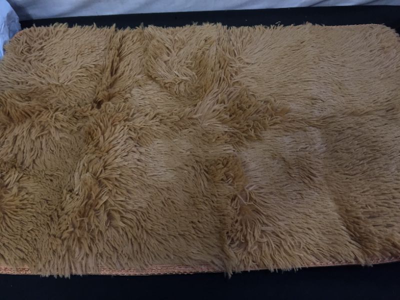 Photo 1 of 31X19 .5 INCH SHAGGY FLOOR MAT LIGHT BROWN WITH NON SLIP BOTTOM 