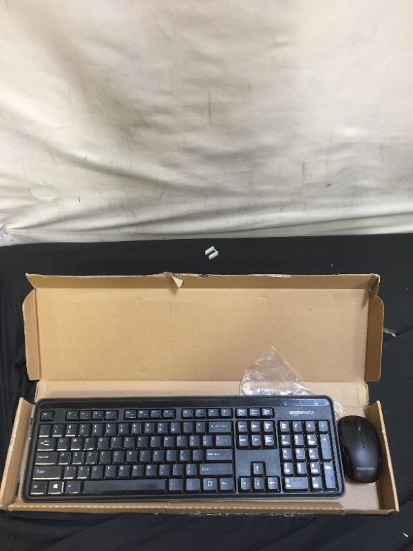 Photo 1 of Amazon Basics Wireless Computer Keyboard and Mouse Combo - Quiet and Compact - US Layout (QWERTY)
