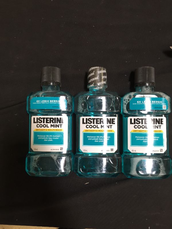 Photo 1 of 3  bottles of mouth wash 