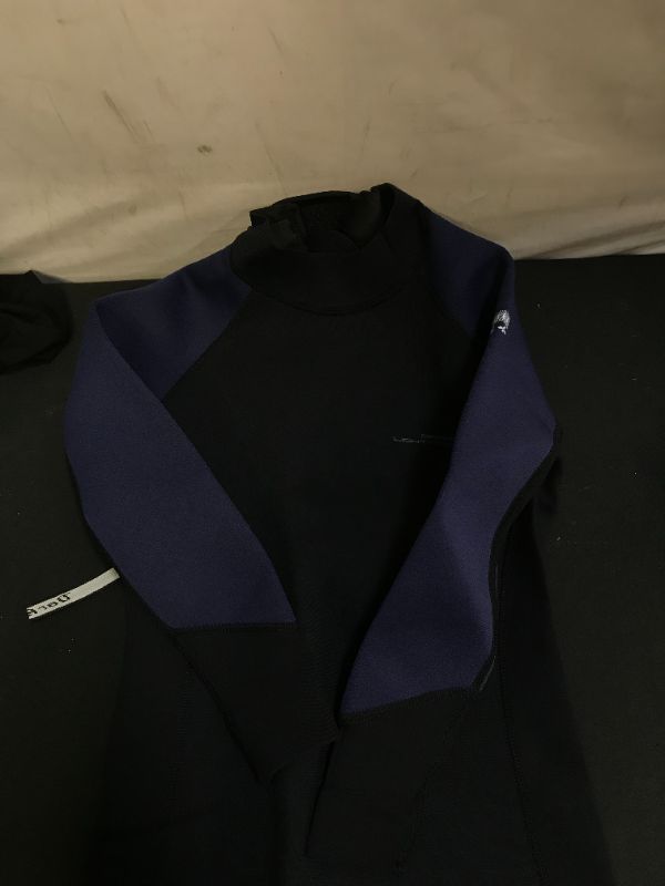 Photo 2 of kids wet suit size 10 