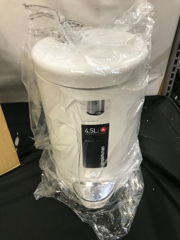 Photo 1 of DENTED--simplehuman 1.2-Gallon Round Step Trash Can, White Steel