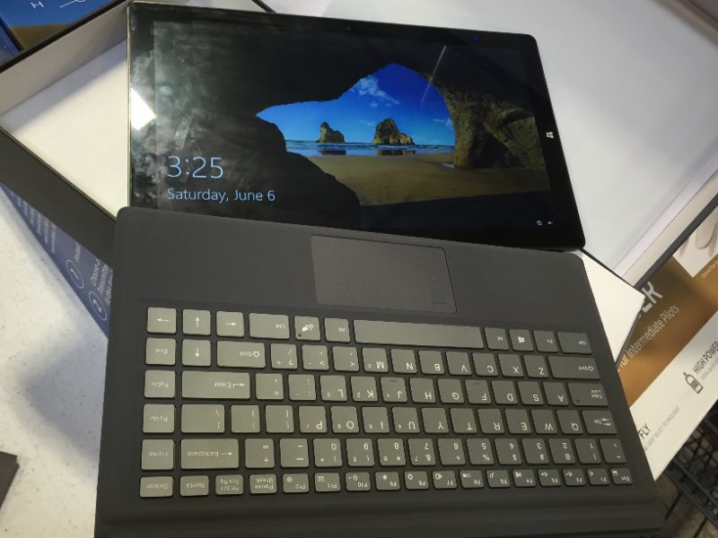 Photo 8 of laptop is locked.-----Laptops 2 in 1, 13.3 inch Full HD IPS 1920x1080 Touchscreen, 4GB RAM, 64GB ROM, Intel Celeron Processor, Windows 10, Detachable Keyboard, Support 128GB SSD Extension, Win Book
