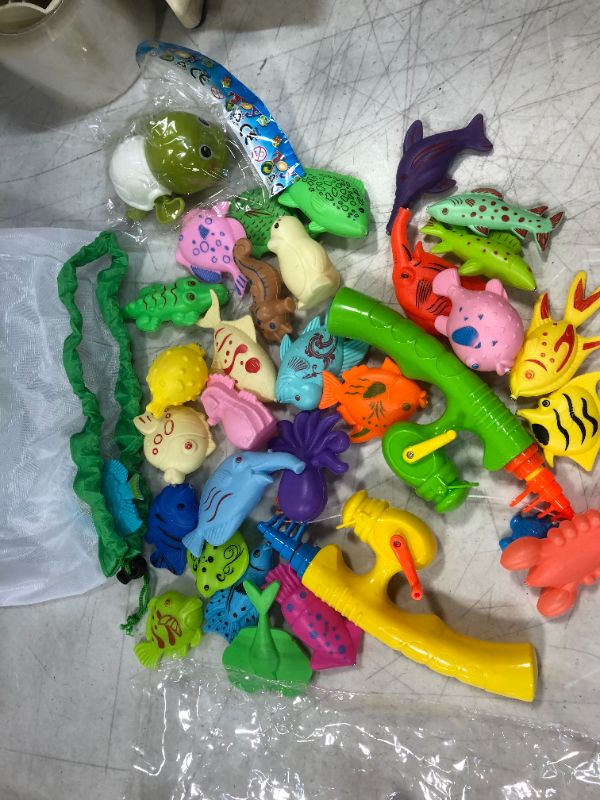 Photo 1 of Magnetic Fishing Game Water Toy - 2 Fishing Poles, 1 Wind Up Swimming Turtle and 30 Colorful Magnetic Fish for Kiddie Pool, Water Table or Bath Fun