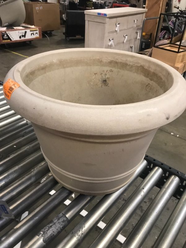 Photo 1 of 20in W X 18in TALL TAN PLASTIC PLANTER 