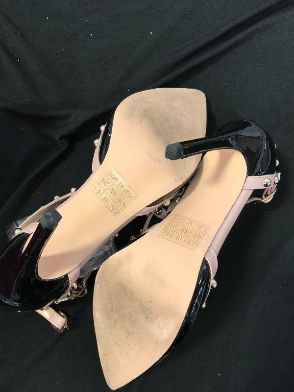 Photo 2 of women's heels size 7.5 - has dirt from previous use but no damage 