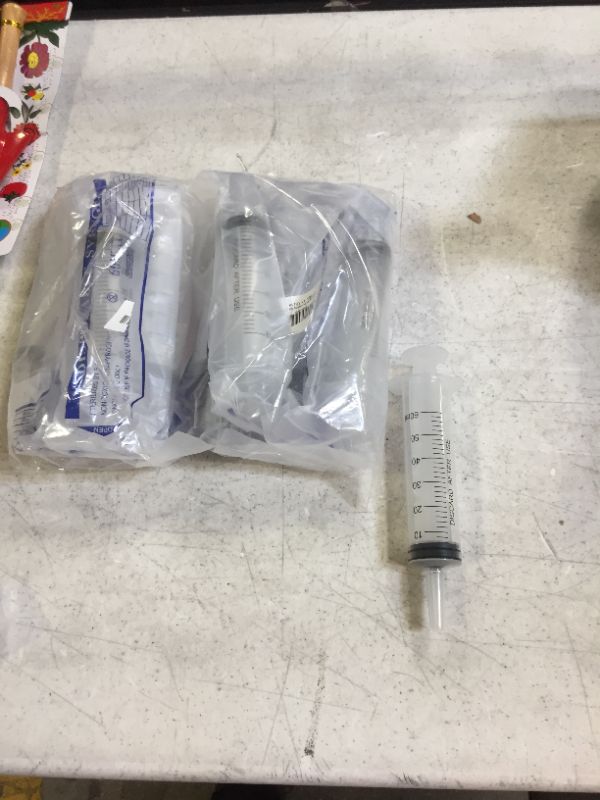 Photo 1 of 10 60 ml /cc disposable syringe