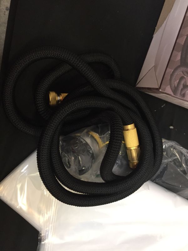 Photo 2 of 25 ft Expandable Garden Hose - New Lightweight Flexible Water Hose with Solid Brass Fittings, Extra Strength Casing, Durable Latex Tube - Retractable Expanding Gardening Hoses with Spray Nozzle
