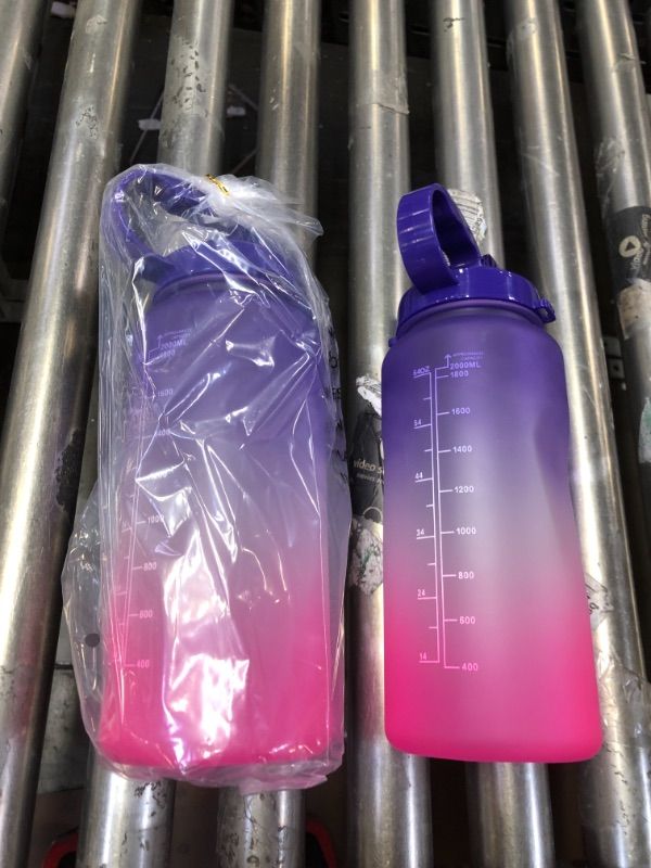 Photo 2 of 2 PACK 64OZ WATER BOTTLES. COLOR PURPLE PINK.