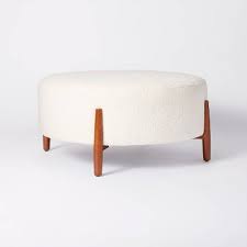 Photo 1 of Elroy Sherpa Round Cocktail Ottoman with Wood Legs Cream - Threshold™ designed with Studio McGee. Dimensions (Overall): 18 Inches (H) x 37 Inches (W) x 37 Inches (D)

