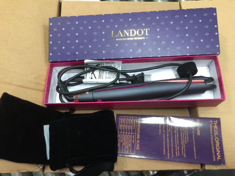 Photo 1 of landot hair curler-- comes with carrying case and glove 