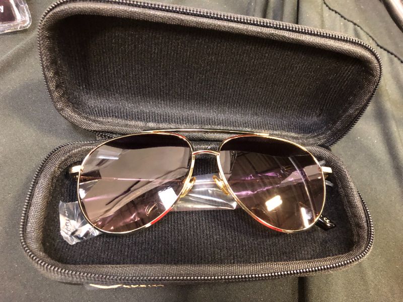 Photo 1 of Generic luenx men/women sun glasses   ( box is damage )