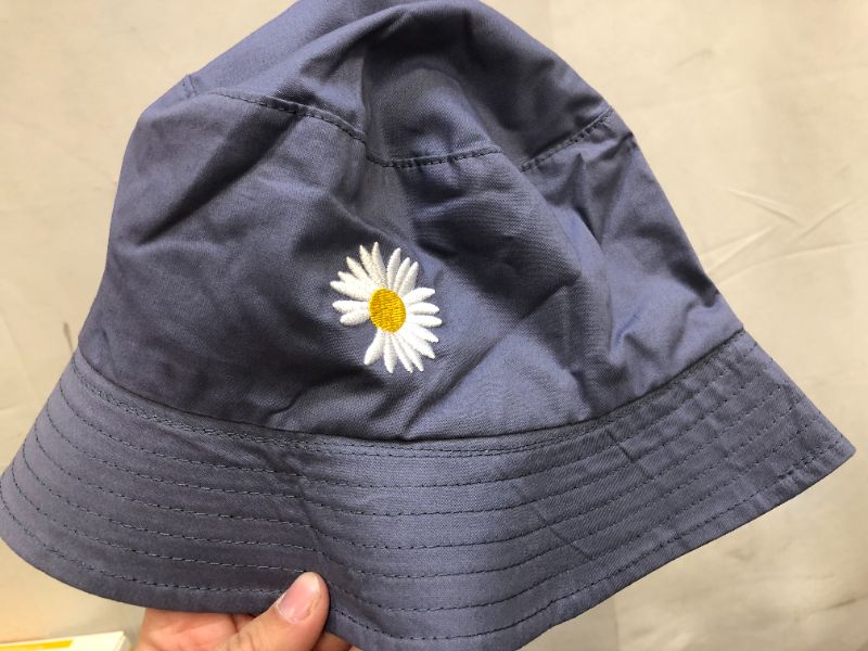 Photo 2 of SUNFLOWER REVERSIBLE BUCKET HAT BLACK AND BLUE 