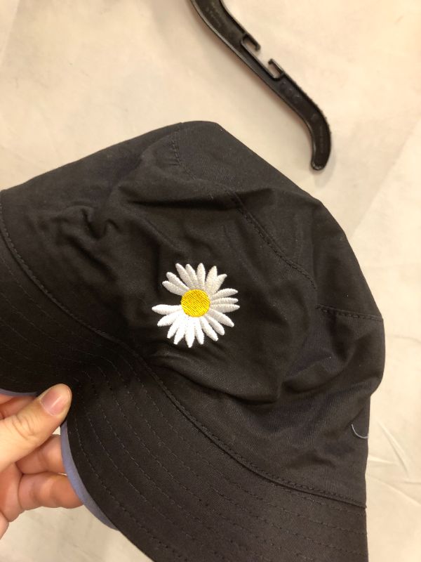 Photo 1 of SUNFLOWER REVERSIBLE BUCKET HAT BLACK AND BLUE 