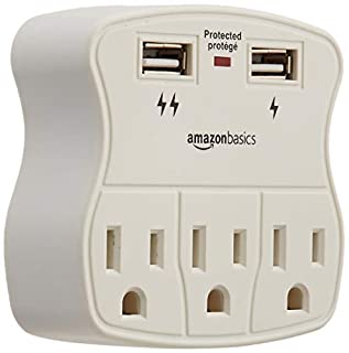 Photo 1 of AmazonBasics 3-Outlet Surge Protector with 2 USB Ports  ***new factory sealed***