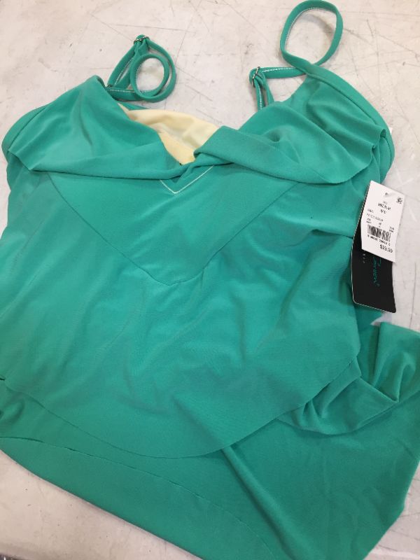 Photo 1 of GREEN SWIMSUIT TOP 
SIZE MEDIUM