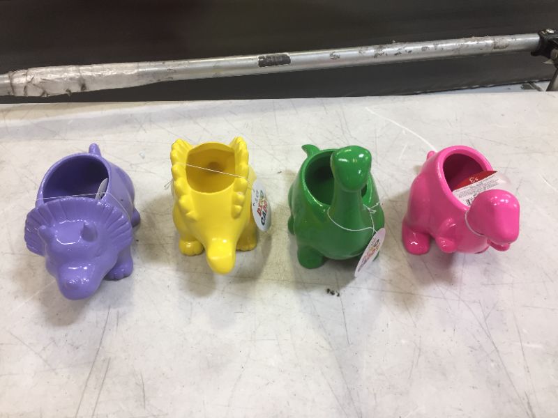 Photo 1 of 4 PACK DINOSAUR CADDYS 