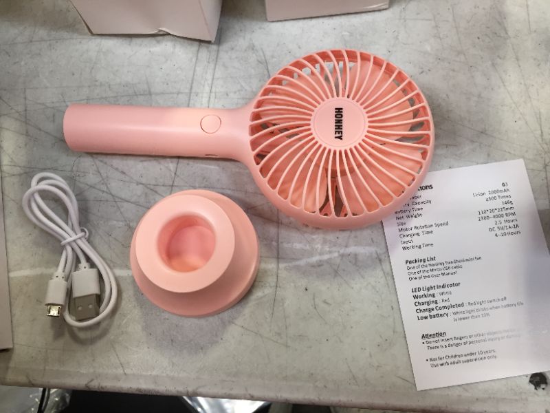 Photo 1 of HonHey Handheld Fan Portable, Mini Hand Held Fan with USB Rechargeable Battery, 3 Speed Personal Desk Table Fan with Base, 8-12 Hours Operated Small Makeup Eyelash Fan for Women Girls Kids Outdoor
