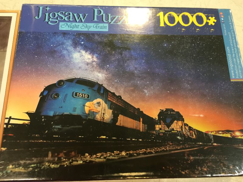 Photo 1 of 2 PACK PUZZLES 
