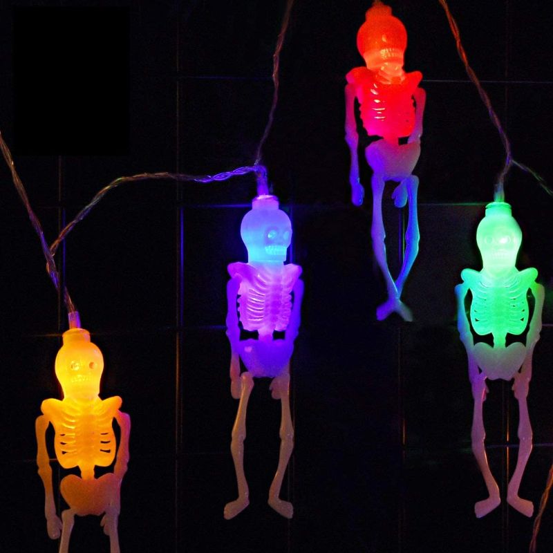 Photo 1 of Skeleton Lights Halloween String Lights - 10Ft 20LEDs Skeletons Halloween Lights Decoration, 2 Lighting Modes Battery-Powered String Lights, Spooky Halloween Lights for Party Patio Indoor Outdoor

