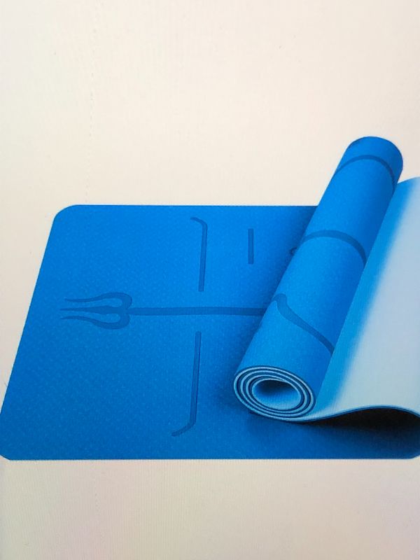 Photo 1 of BLUEGALA NON SLIP TPE YOGA MAT WITH CARRYING STRAP STANDARD FITNESS & YPOGA MAT FPOR MEN AND WOMEN 72" L x 24" W x 1/4" THICKNESS