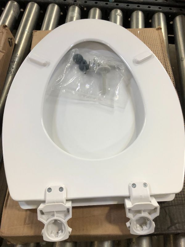 Photo 1 of Bemis 1500EC 390 Lift-Off Wood Elongated Toilet SEAT, Cotton White