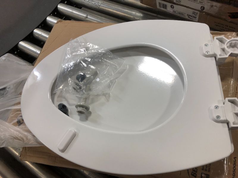 Photo 2 of Bemis 1500EC 390 Lift-Off Wood Elongated Toilet SEAT, Cotton White 3 PACK (SOME ARE MISSING HARDWARE)