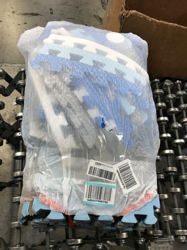 Photo 1 of big rubber puzzle floor mat
PACKED IN GARBAGE BAG - USED - UNKNOWN IF MISSING PARTS