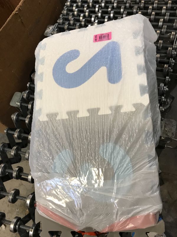 Photo 1 of big rubber puzzle floor mat
PACKED IN GARBAGE BAG - USED - UNKNOWN IF MISSING PARTS