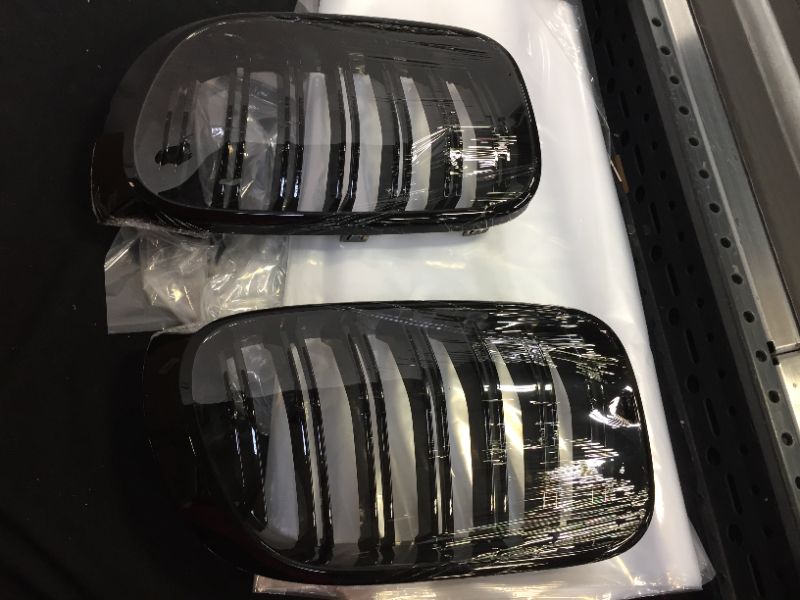 Photo 1 of 15" X 8.5" HEADLIGHT COVERS (UNKNOWN MODEL AND MAKE VEHICLE FIT) SOLD AS IS