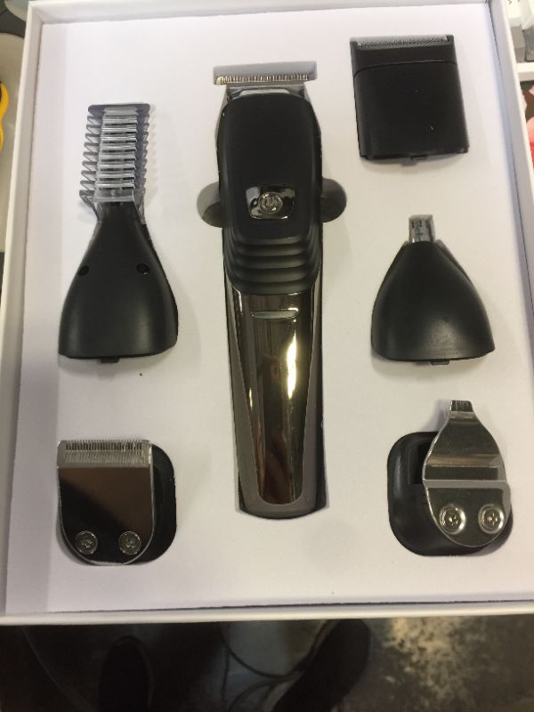 Photo 1 of  pro hair trimmer professional for men 6 in 1 grooming kit (item is new opened it to take photos)
