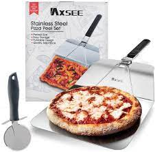 Photo 1 of  METAL PIZA PEEL 10 INCH PIZZA PADDLE (MAJOR DAMAGES TO BOX)