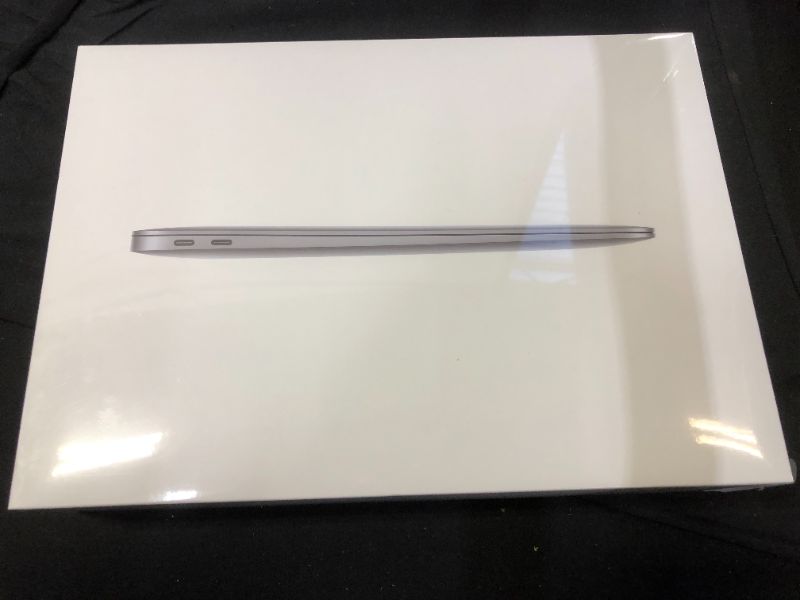 Photo 2 of 2020 Apple MacBook Air Laptop: Apple M1 Chip, 13” Retina Display, 8GB RAM, 256GB SSD Storage, Backlit Keyboard, FaceTime HD Camera, Touch ID. Works with iPhone/iPad; Space Gray(FACTORY SEALED)
