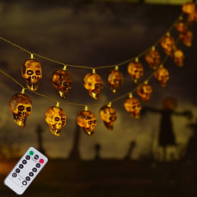 Photo 1 of ILLUMINEW 30 LED Halloween Skull String Lights, 8 Modes Fairy Lights with Remote, 16.4ft Waterproof Battery Operated Halloween Lights for Outdoor Indoor Party Bar Halloween Decoration 2 pack 
