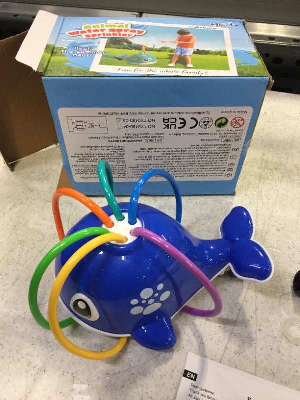 Photo 1 of water sprinkler toy 