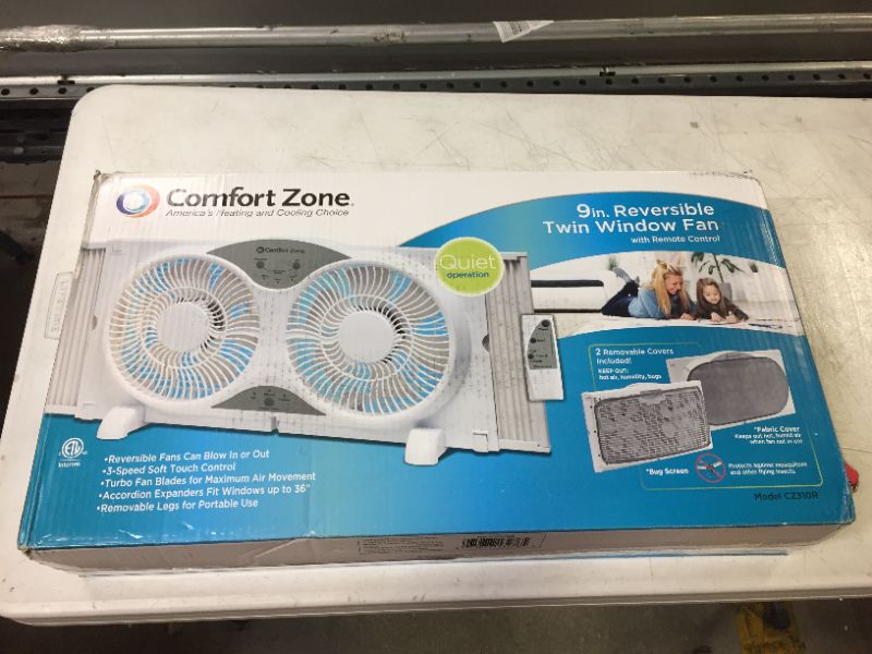 Photo 2 of Comfort Zone CZ310R 3-Speed 3-Function Expandable Reversible Twin Window Fan with Remote Control, Removable Cover
