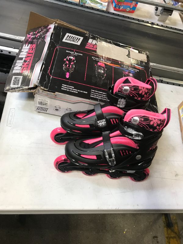 Photo 2 of high bounce adjustable large pink roller skates size 6-9 box is damaged 