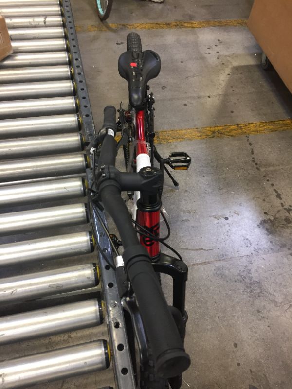 Photo 1 of Hyper 29" Explorer Men''s Dual Suspension Mountain Bike, Red HANDLE BAR ORIENTATION NEEDS TO BE FIXED, FRONT BRAKES DO NOT WORK/MISSING 
