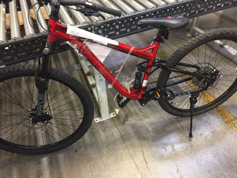 Photo 2 of Hyper 29" Explorer Men''s Dual Suspension Mountain Bike, Red HANDLE BAR ORIENTATION NEEDS TO BE FIXED, FRONT BRAKES DO NOT WORK/MISSING 
