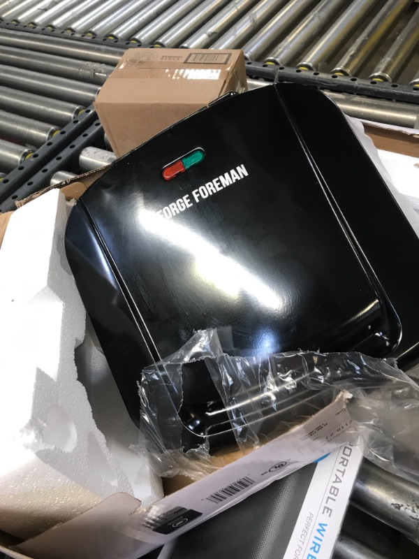 Photo 1 of George Foreman 4-Serving Removable Plate Electric Grill and Panini Press, Black, GRP1060B