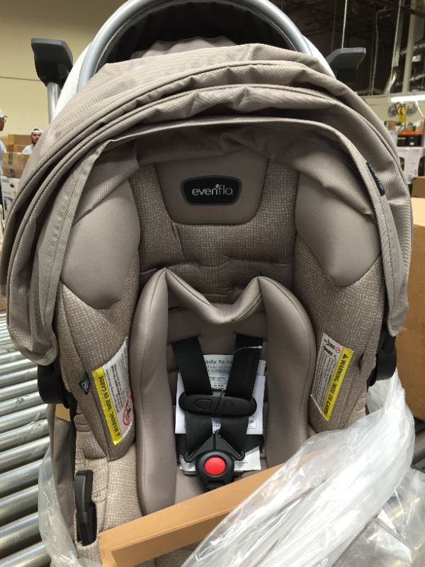 Photo 3 of Evenflo Pivot Modular Travel System with SafeMax Infant Car Seat - Sandstone