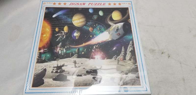 Photo 1 of 1000 piece jigsaw puzszle of the moon and surrounding planets