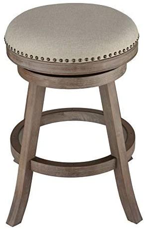 Photo 1 of Cortesi Home Sadie Backless Swivel Counter Stool in Solid Wood & Beige, 24" Height, Beige Fabric
