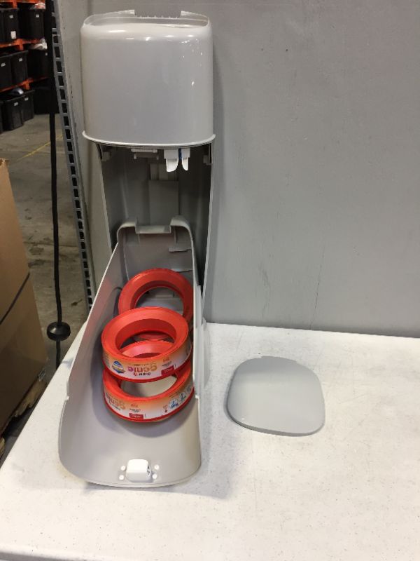 Photo 1 of Diaper Genie Complete Pail with 3 Refill (ITEM HAS SCRATCHES)