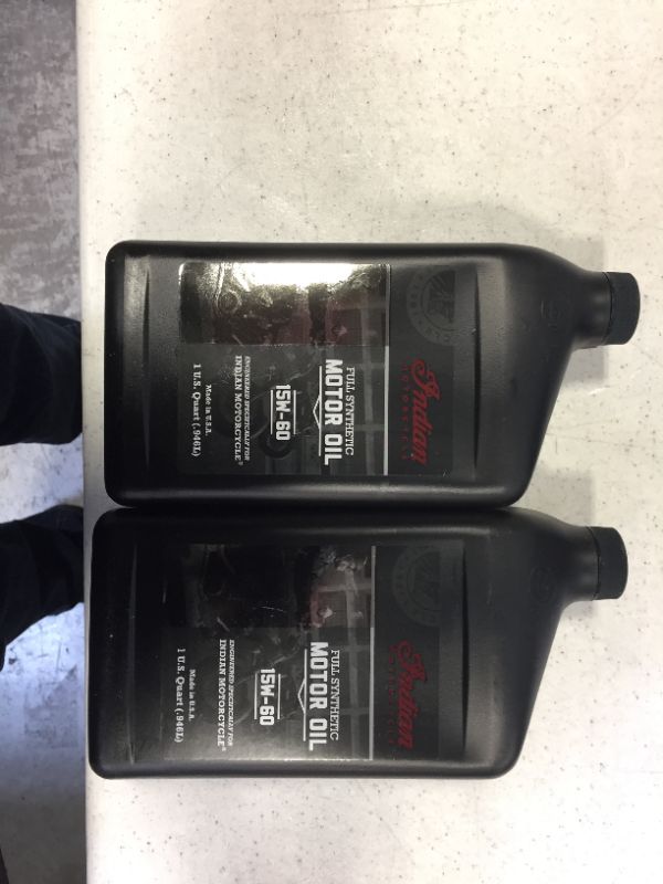 Photo 1 of 2 bottles of 15w 60 motor oil