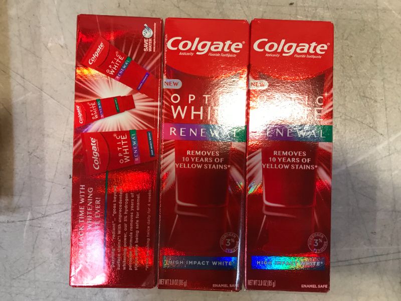 Photo 2 of Colgate Optic White Renewal Teeth Whitening Toothpaste with Fluoride, 3% Hydrogen Peroxide, High Impact White - 3 Ounce (3 Pack)
