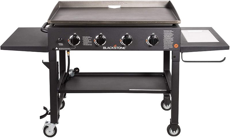 Photo 1 of  Blackstone 36" Cooking Station 4 Burner Propane Fuelled Restaurant Grade Professional 36 Inch Outdoor Flat Top Gas Griddle with Built in Cutting Board, Garbage Holder and Side Shelf (1825), Black

