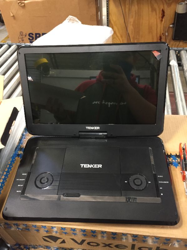 Photo 2 of TENKER 17.9" Portable DVD Player with 15.6” Swivel Screen, 4 Hours Rechargeable Battery with SD Card Slot and USB Port, with 1.8M Car Charger, Black
