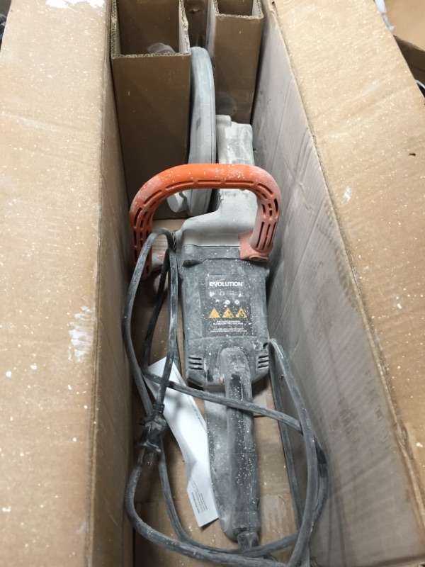 Photo 2 of EVOLUTION POWER TOOLS 12 in. Basic Electric Concrete Saw

//MINOR DAMAG FROM PREVIOUS USE, EXTEMELY DIRTY FROM PREVIOUS USE 
